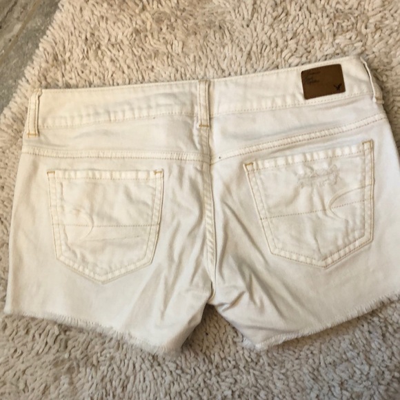 Distressed white denim shorts - Picture 2 of 6